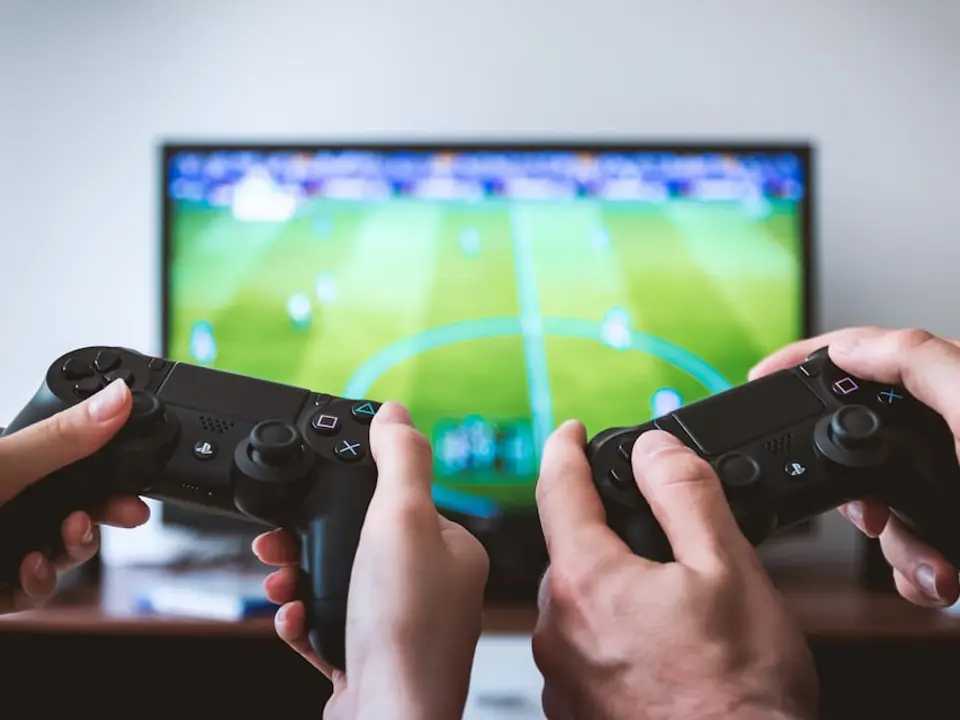 People playing a console game