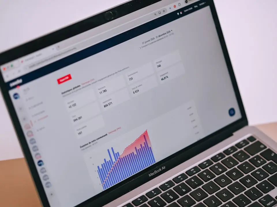 Laptop showing charts and statistics
